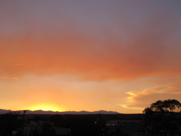 I finally found a place to watch the sun set in Santa Fe, on the top floor of the parking deck near my B&B. The colors and clouds were beautiful. 