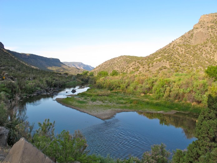 I drove from Taos through the Santa Fe National Forest. This tributary of the Rio Grande was still and beautiful, reflecting the early morning light. 