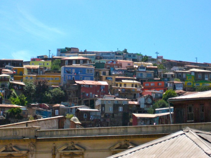 Colorful houses line the hillsdie